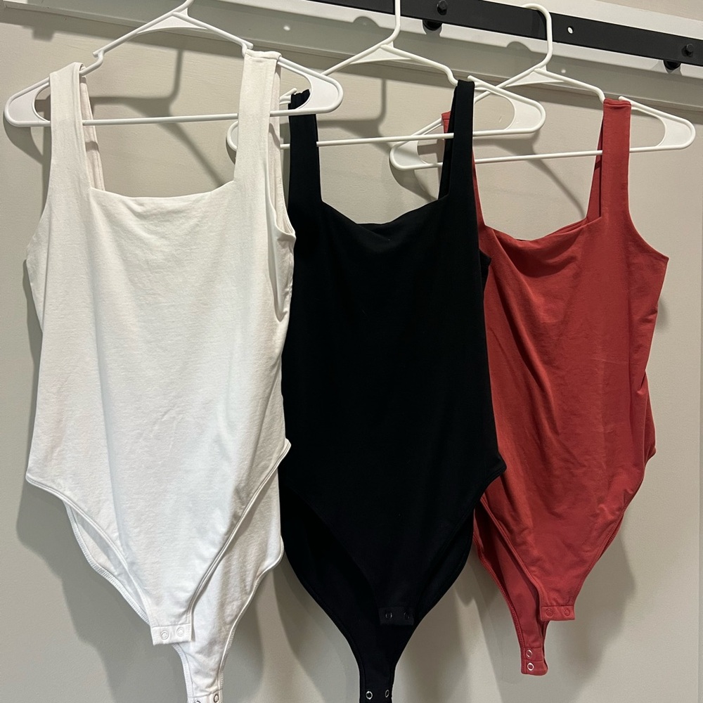 Set of Three Bodysuits - White, Black, and Red